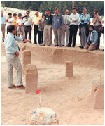 Archaeologist Glen Hanson interprets an excavated prehistoric site