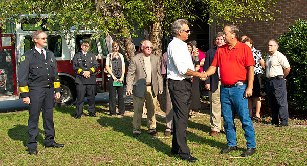 SRNS President & CEO Garry Flowers greets Allendale County Fire Chief Rodney Stanley after SRNS Fire Chief Rob Still had symbolically presented a set of truck keys to Chief Stanley.