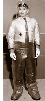 One-piece plastic suit designed for use in a tritiated environment.