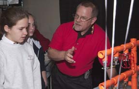 Student interacting with SRS employee